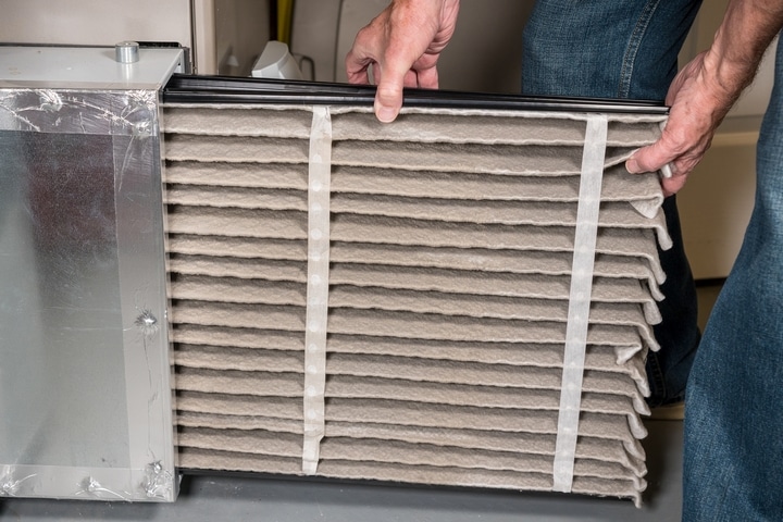 Next, clean or replace the furnace filter.
